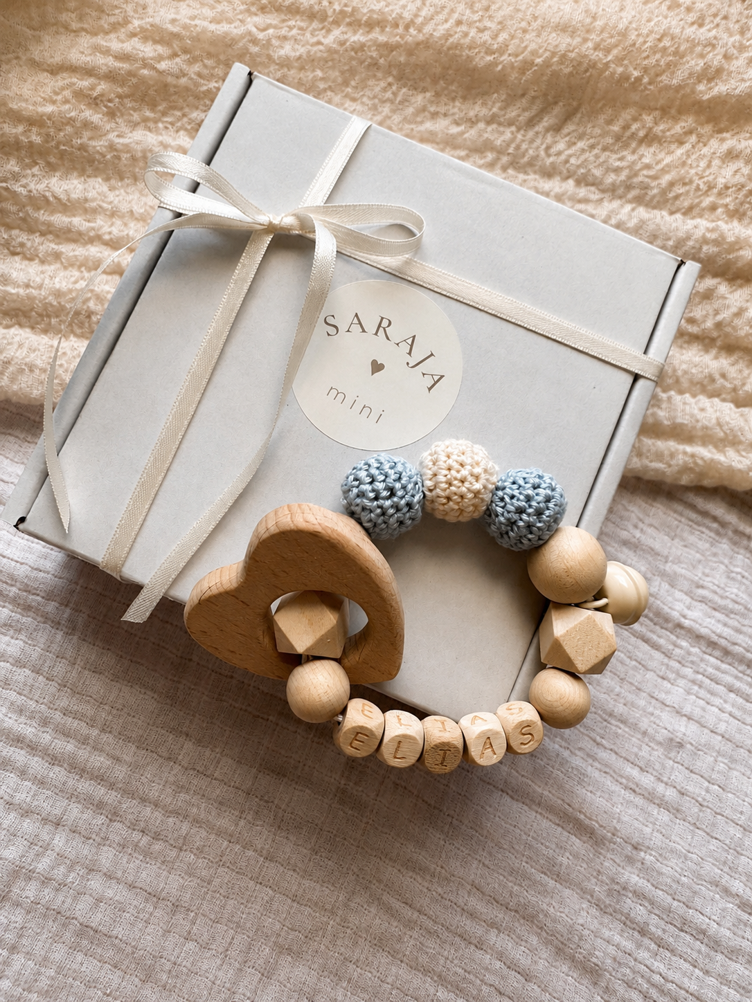 Greifling mit Geschenkeverpackung